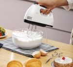 hand mixer front view – electric egg beater with stainless steel beaters and turbo button