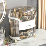 cosmetic organizer filled with makeup products – acrylic storage box with lipstick holder and brush stand
