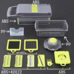 Multipurpose vegetable cutter being used by a home cook to prepare fresh vegetables for a family meal on wooden cutting board