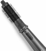 BaByliss AirStyler Pro 1000 hair styling kit with all attachments laid out next to the main unit and travel case